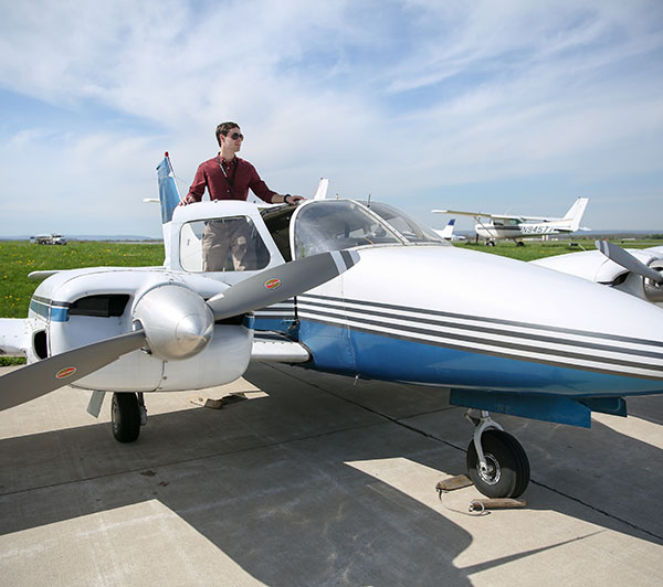 Student Getting into airplane