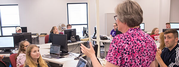 Instructor and students in classroom