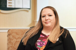 Vanessa Berger sits in the lobby of Country Meadows Senior Living.