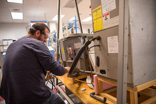 HVAC student working